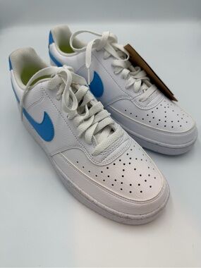Nike White Leather Sneakers with Blue Swoosh Accents